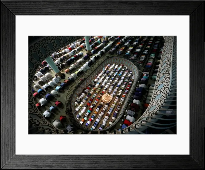Framed Print : Muslims perform Friday prayer on the first day of Ramadan at Baitul Mukarram National