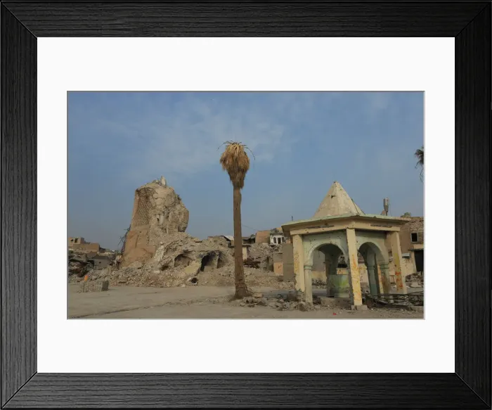 Framed Print : The destroyed al-Hadba minaret at the Grand al-Nuri Mosque is seen in the Old City of