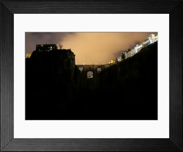 Framed Print : The Puente Nuevo (New Bridge) is seen during the Earth Hour in Ronda Framed Print : The Puente Nuevo (New Bridge) is seen during the Earth Hour in Ronda