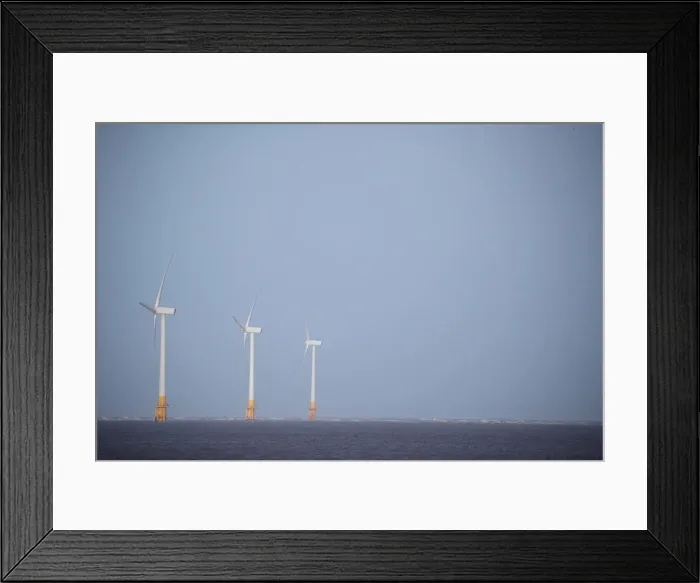 Framed Print : An offshore wind farm is seen from Great Yarmouth Framed Print : An offshore wind farm is seen from Great Yarmouth