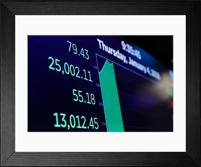 Framed Print : A board shows the Dow Jones Industrial Average as it rises above 25 Framed Print : A board shows the Dow Jones Industrial Average as it rises above 25