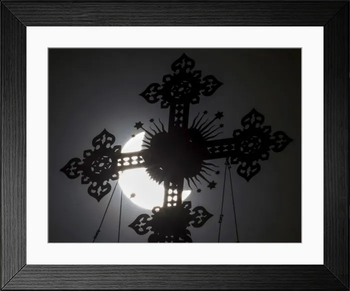 Framed Print : A cross on the dome of the Cathedral of Christ the Saviour is seen during a partial solar Framed Print : A cross on the dome of the Cathedral of Christ the Saviour is seen during a partial solar