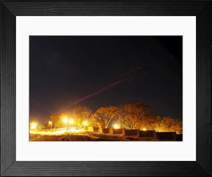 Framed Print : The sky over Sanaa is illuminated by anti-aircraft fire during a Saudi-led air strike in Framed Print : The sky over Sanaa is illuminated by anti-aircraft fire during a Saudi-led air strike in
