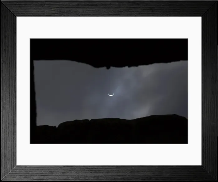 Framed Print : The solar eclipse is seen over Stonehenge on Salisbury Plain, Salisbury, southern England Framed Print : The solar eclipse is seen over Stonehenge on Salisbury Plain, Salisbury, southern England
