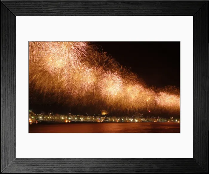 Framed Print : Fireworks explode above Copacabana beach in Rio de Janeiro Framed Print : Fireworks explode above Copacabana beach in Rio de Janeiro