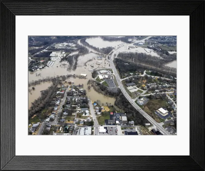 Framed Print : Submerged roads and houses are seen after several days of heavy rain led to flooding