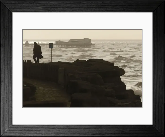 Framed Print : A man watches Storm Gertrude whips up the Irish sea off Blackpool as it crosses over Framed Print : A man watches Storm Gertrude whips up the Irish sea off Blackpool as it crosses over