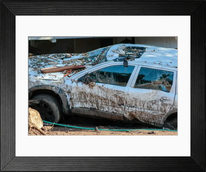 Framed Print : A damaged vehicle is seen after a mudslide in Montecito Framed Print : A damaged vehicle is seen after a mudslide in Montecito