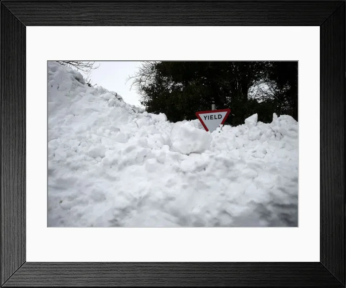 Framed Print : A road sign is seen submerged in deep snow in Kilteel Framed Print : A road sign is seen submerged in deep snow in Kilteel