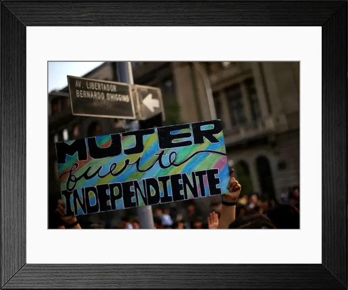 Framed Print : A banner reading Woman, strong and independent is seen during a march to mark Framed Print : A banner reading Woman, strong and independent is seen during a march to mark