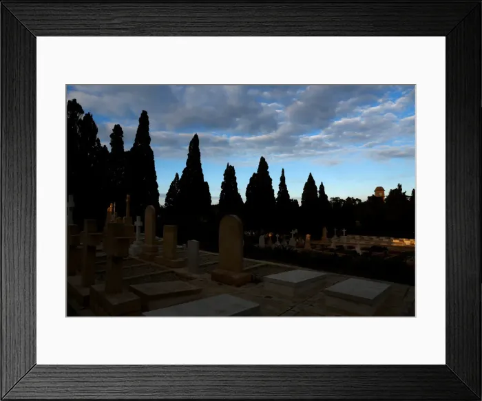 Framed Print : The Saint Patricks Barracks clock tower is seen from the Pembroke Military Cemetery in Framed Print : The Saint Patricks Barracks clock tower is seen from the Pembroke Military Cemetery in