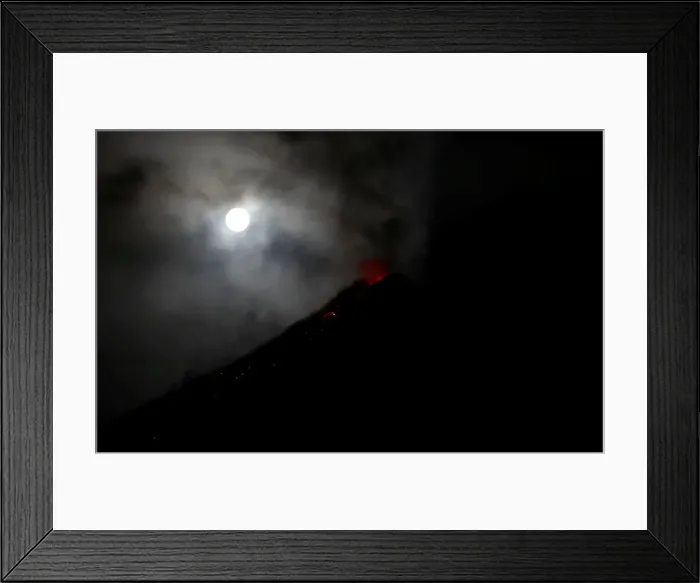 Framed Print : The super blue moon illuminates Mayon Volcano as it spews lava during a mild eruption Framed Print : The super blue moon illuminates Mayon Volcano as it spews lava during a mild eruption