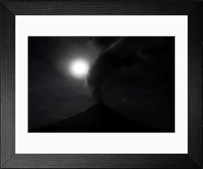 Framed Print : The super blue moon is seen above the Mayon Volcano during a total eclipse in Legazpi