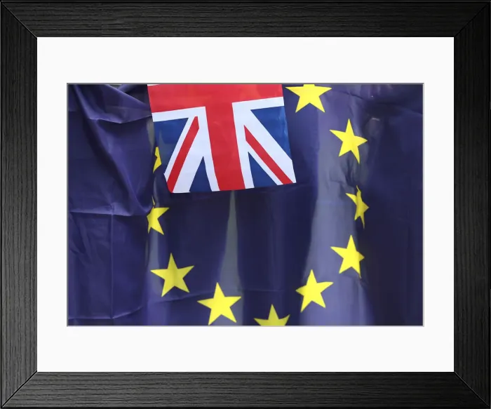 Framed Print : A British Union flag flies in front of an EU flag during a pro-EU referendum event Framed Print : A British Union flag flies in front of an EU flag during a pro-EU referendum event