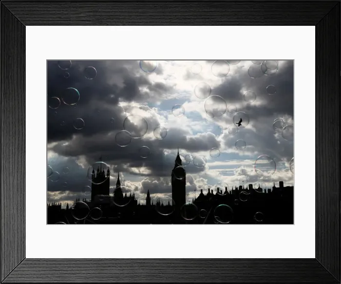 Framed Print : Soap bubbles float past the Houses of Parliament in central London Framed Print : Soap bubbles float past the Houses of Parliament in central London