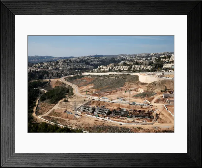 Framed Print : A general view shows the Israeli settlement of Ramot in an area of the occupied West Bank Framed Print : A general view shows the Israeli settlement of Ramot in an area of the occupied West Bank