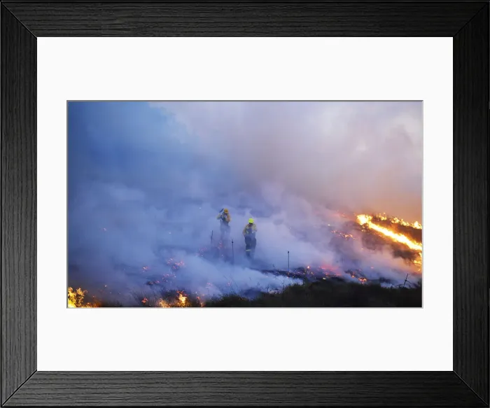 Framed Print : Firefighters walk through smoke while fighting a forest fire near the Basque town of Framed Print : Firefighters walk through smoke while fighting a forest fire near the Basque town of