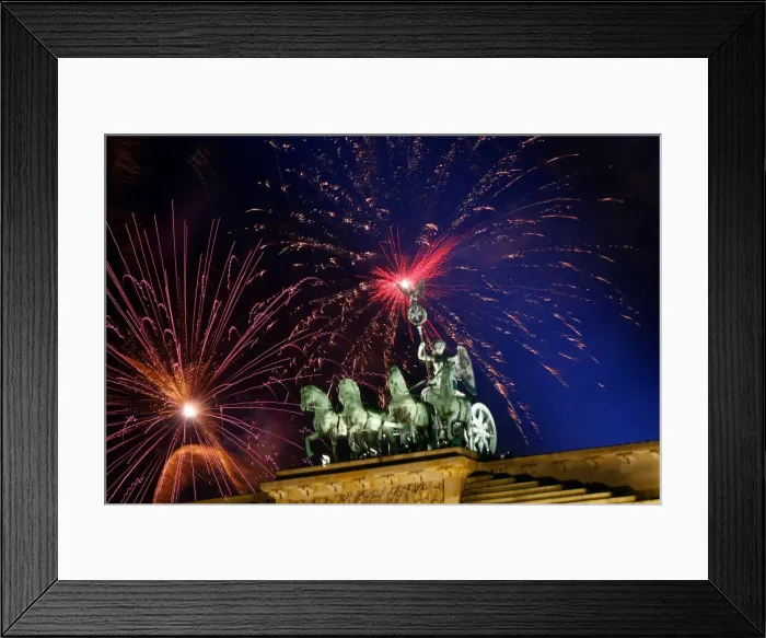 Framed Print : Fireworks explode next to the Quadriga sculpture atop the Brandenburg gate during New Framed Print : Fireworks explode next to the Quadriga sculpture atop the Brandenburg gate during New