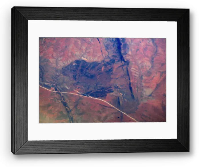 Framed Print : A truck travels along a dirt road in outback Western Australia