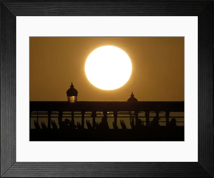 Framed Print : A London bus is seen during sunset in London Framed Print : A London bus is seen during sunset in London