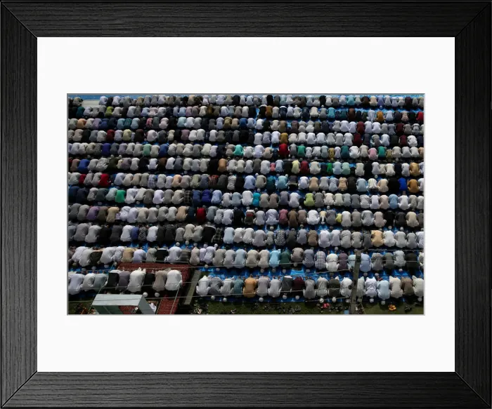 Framed Print : Kashmiris offer Eid-al-Adha prayers at a mosque during restrictions after the scrapping Framed Print : Kashmiris offer Eid-al-Adha prayers at a mosque during restrictions after the scrapping