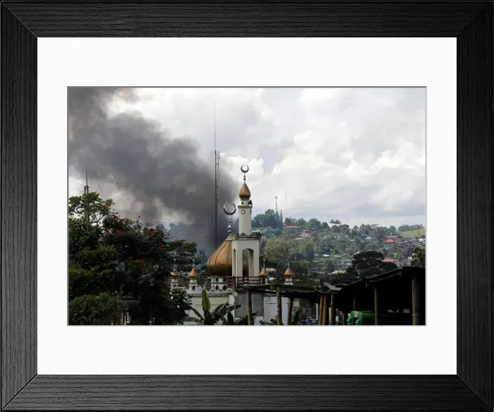 Framed Print : Smoke billows at the site of fighting between government soldiers and Maute group