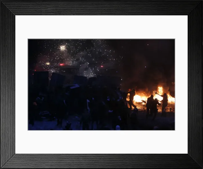 Framed Print : Pro-European protesters burn tyres and set off fireworks during clashes with riot police Framed Print : Pro-European protesters burn tyres and set off fireworks during clashes with riot police