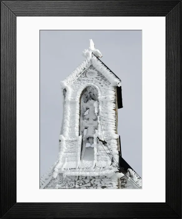 Framed Print : The frozen tower of Wendelstein church is pictured near Bayrischzell Framed Print : The frozen tower of Wendelstein church is pictured near Bayrischzell
