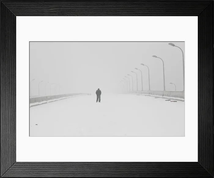 Framed Print : Pedestrian walks during snowfall in Shanghai Framed Print : Pedestrian walks during snowfall in Shanghai