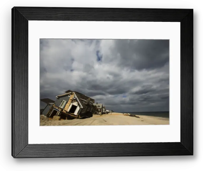 Framed Print : A home destroyed nearly five months ago during the landfall of Superstorm Sandy is