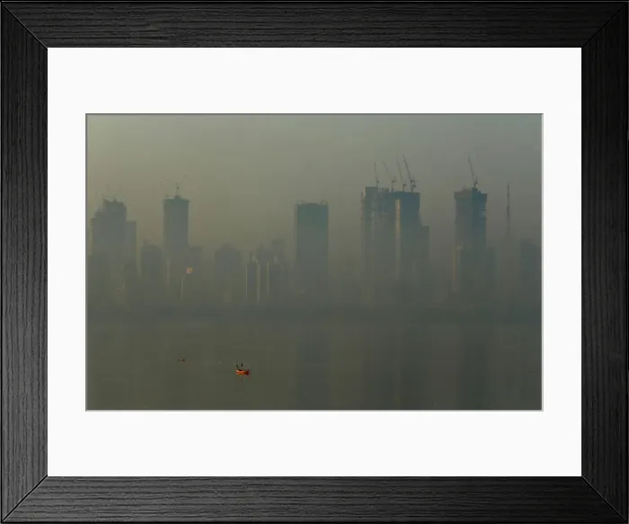 Framed Print : Buildings are seen shrouded in smog in Mumbai Framed Print : Buildings are seen shrouded in smog in Mumbai