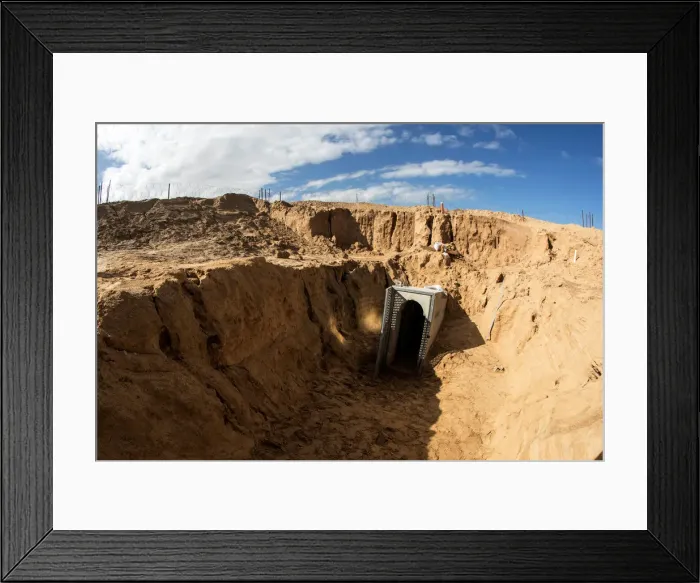 Framed Print : An entrance to what the Israeli military say is a cross-border attack tunnel dug Framed Print : An entrance to what the Israeli military say is a cross-border attack tunnel dug