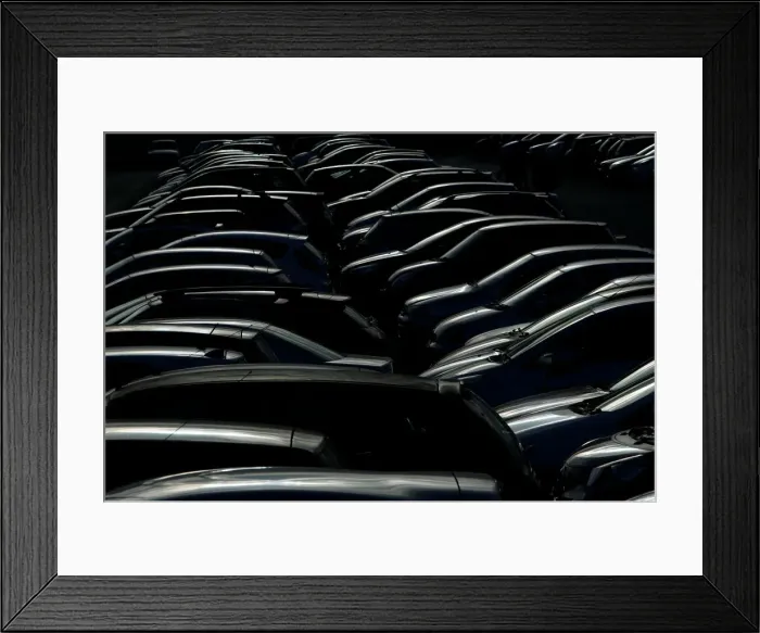 Framed Print : Cars are seen in a car park in Floriana Framed Print : Cars are seen in a car park in Floriana