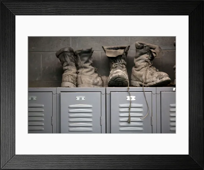 Framed Print : Coal mining boots are shown above miners lockers before the start of an afternoon shift Framed Print : Coal mining boots are shown above miners lockers before the start of an afternoon shift