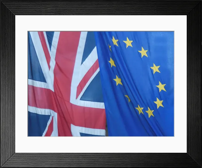 Framed Print : A Union flag flies next to the flag of the European Union in Westminster, London Framed Print : A Union flag flies next to the flag of the European Union in Westminster, London
