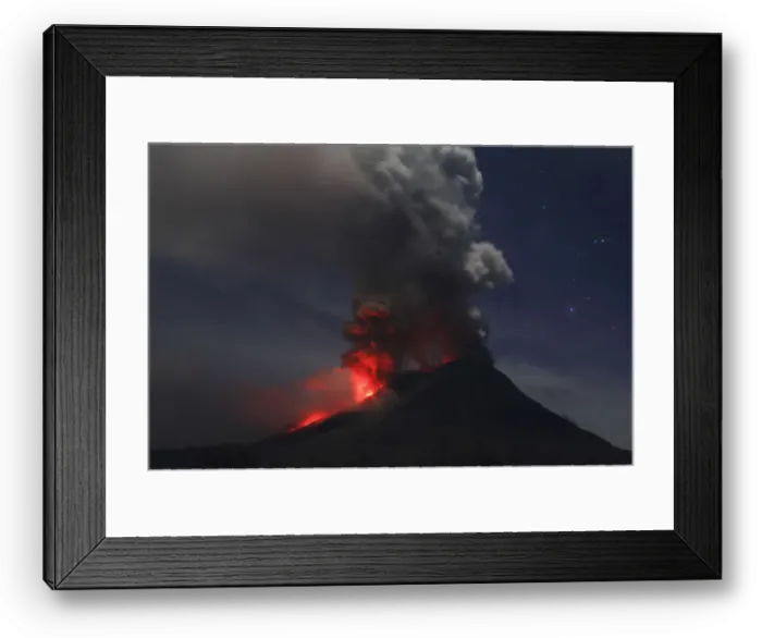 Framed Print : Mount Sinabung is seen during an eruption from Naman Teran village in Karo district Framed Print : Mount Sinabung is seen during an eruption from Naman Teran village in Karo district