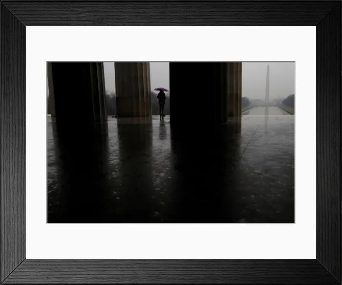 Framed Print : A person stands at the steps of the Lincoln Memorial in Washington Framed Print : A person stands at the steps of the Lincoln Memorial in Washington