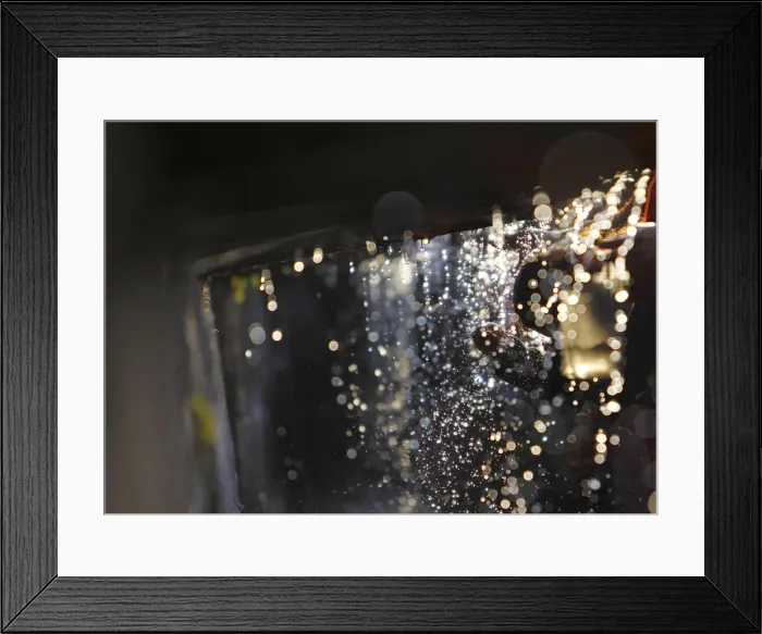 Framed Print : A devotee washes his head at the Balaju Baise Dhara during the Baishak Asnan festival in Framed Print : A devotee washes his head at the Balaju Baise Dhara during the Baishak Asnan festival in