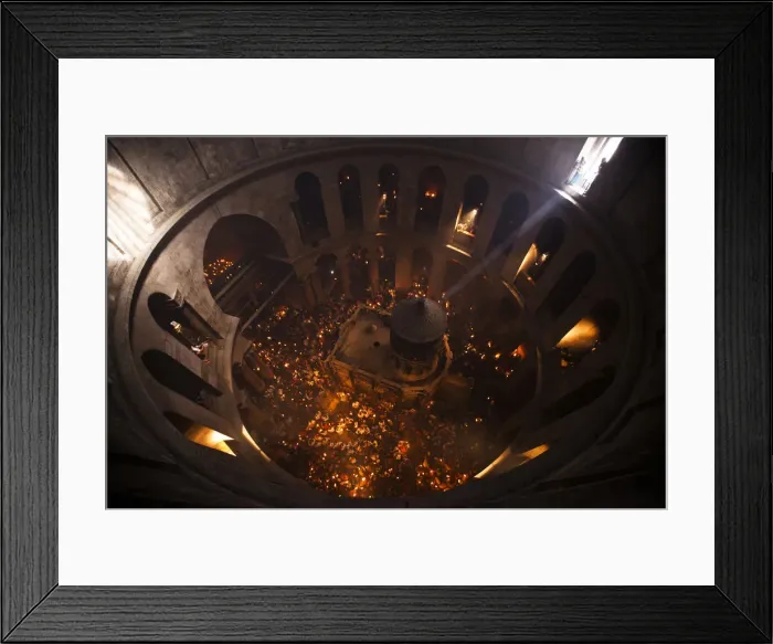Framed Print : Worshippers hold candles as they take part in the Christian Orthodox Holy Fire ceremony
