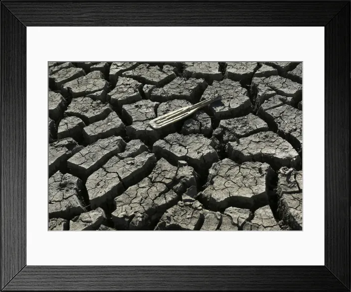 Framed Print : A boat paddle is shown on the bottom of the nearly dry Almaden Reservoir near San Jose Framed Print : A boat paddle is shown on the bottom of the nearly dry Almaden Reservoir near San Jose