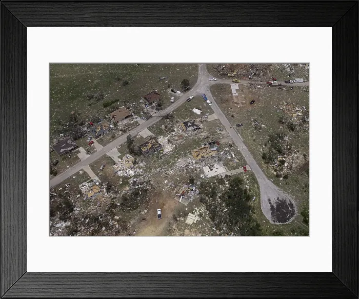 Framed Print : A row of houses are left flattened by a tornado in this aerial photograph taken over Framed Print : A row of houses are left flattened by a tornado in this aerial photograph taken over