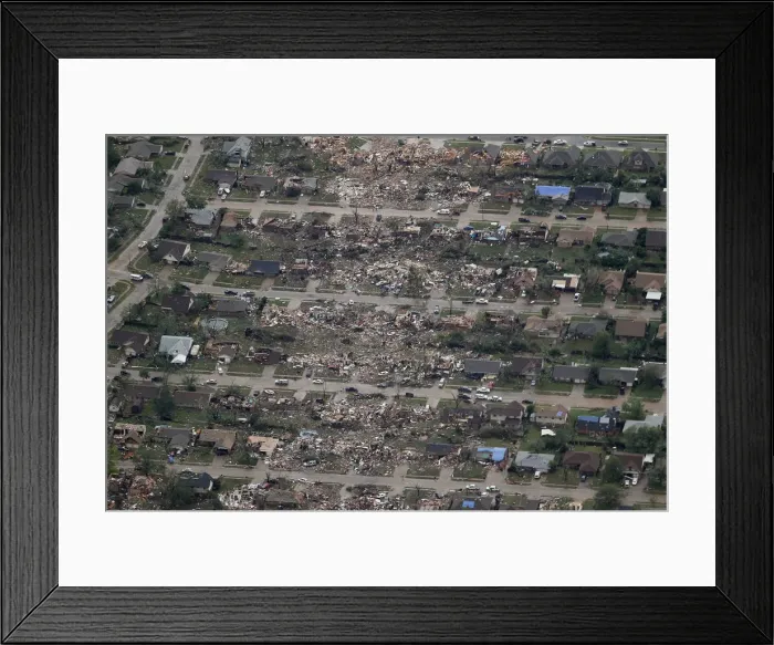 Framed Print : An aerial view shows the path of destruction in the aftermath of a tornado Framed Print : An aerial view shows the path of destruction in the aftermath of a tornado