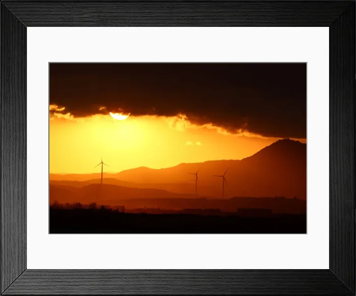 Framed Print : Power-generating windmill turbines are pictured during the sunset near Larnaca Framed Print : Power-generating windmill turbines are pictured during the sunset near Larnaca