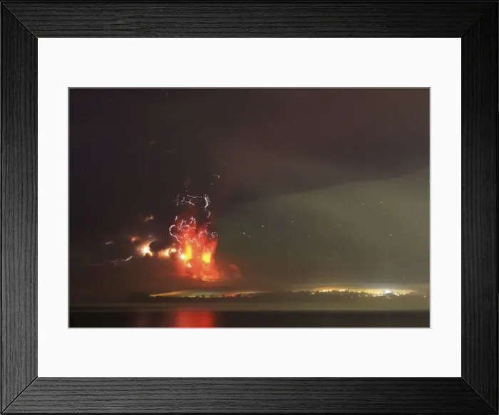 Framed Print : Smoke and lava spew from the Calbuco volcano, as seen from the shores of Lake Llanquihue Framed Print : Smoke and lava spew from the Calbuco volcano, as seen from the shores of Lake Llanquihue