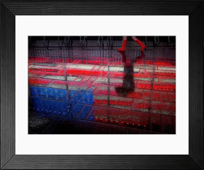Framed Print : A woman walks through the rain in Times Square in Manhattan, New York Framed Print : A woman walks through the rain in Times Square in Manhattan, New York