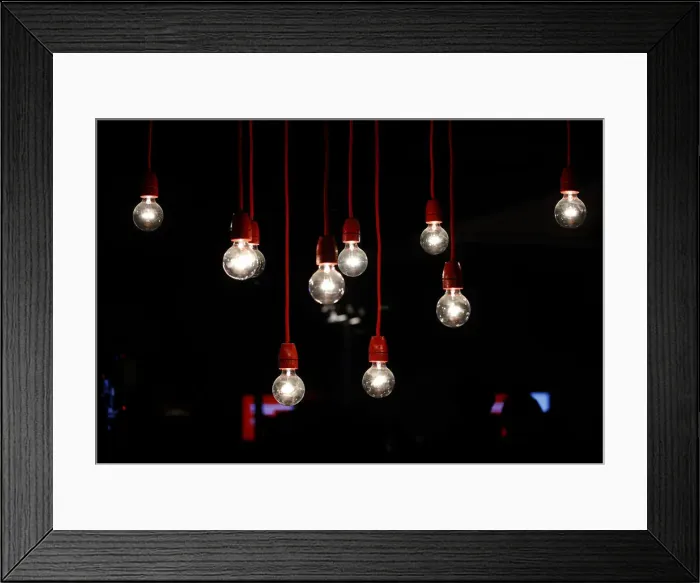 Framed Print : Lit lamps decorate the Vodafone stand at the CeBIT trade fair in Hanover Framed Print : Lit lamps decorate the Vodafone stand at the CeBIT trade fair in Hanover
