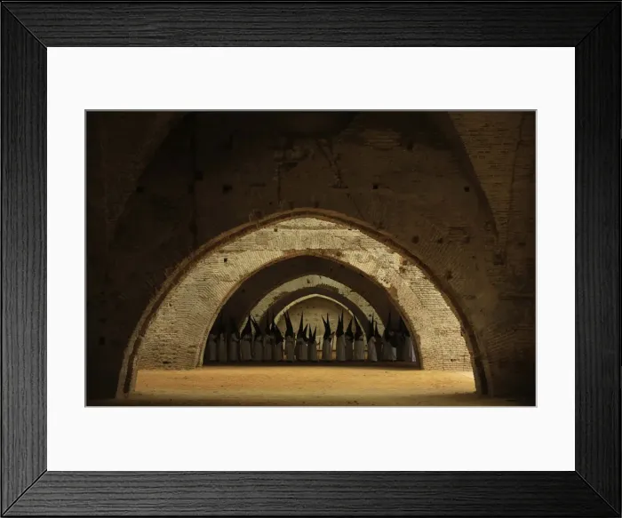 Framed Print : Penitents of Las Aguas brotherhood wait before the start of their penance during Holy Framed Print : Penitents of Las Aguas brotherhood wait before the start of their penance during Holy