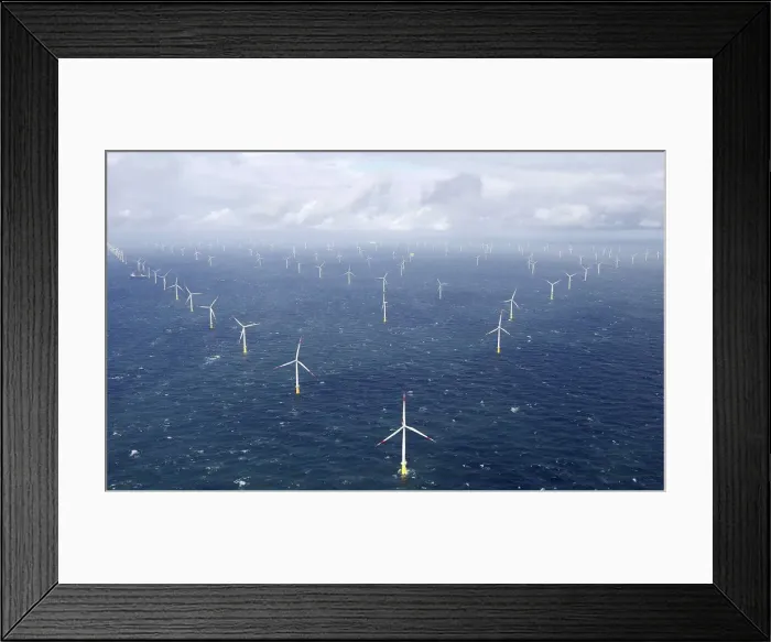 Framed Print : Power-generating windmill turbines are pictured at the Amrumbank West offshore windpark Framed Print : Power-generating windmill turbines are pictured at the Amrumbank West offshore windpark