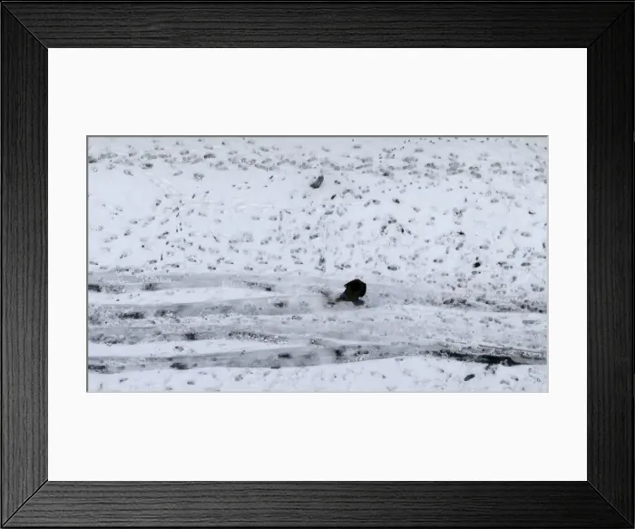 Framed Print : A man walks on a snow-covered street in Tokyo Framed Print : A man walks on a snow-covered street in Tokyo