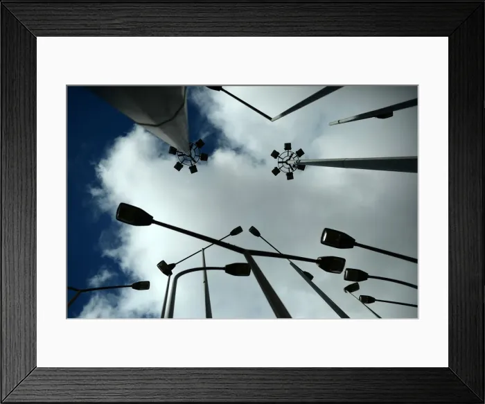 Framed Print : Street lights are silhouetted against the sky in Bilbao Framed Print : Street lights are silhouetted against the sky in Bilbao